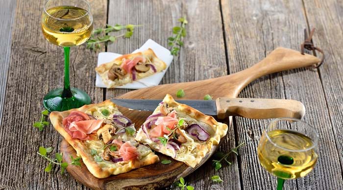 An Alsatian wine makes the perfect pairing with local dish tarte flambée.