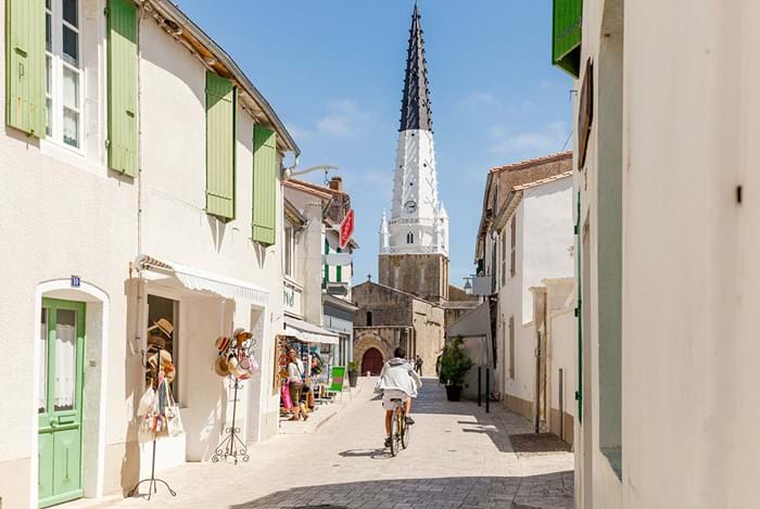The striking black and white bell tower in the heart of Ars-en-Ré