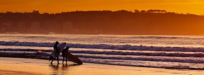 Spain's north coast is a beautiful spot for a sunset surfing session